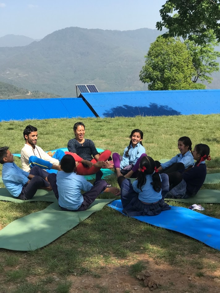 Playing with local children in the hills