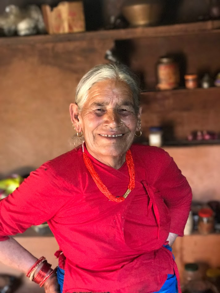 A friendly villager in red